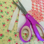 Step 2:  After quilting your block, trim the extra batting from the outside edges.